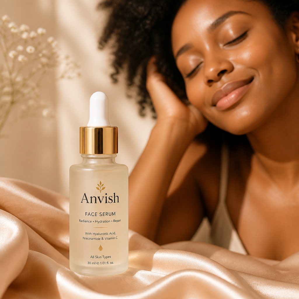 A bright, glowing face smiling softly with eyes closed in a calm moment of self-care beside the elegant Anvish Face Serum bottle on a soft peach silk background