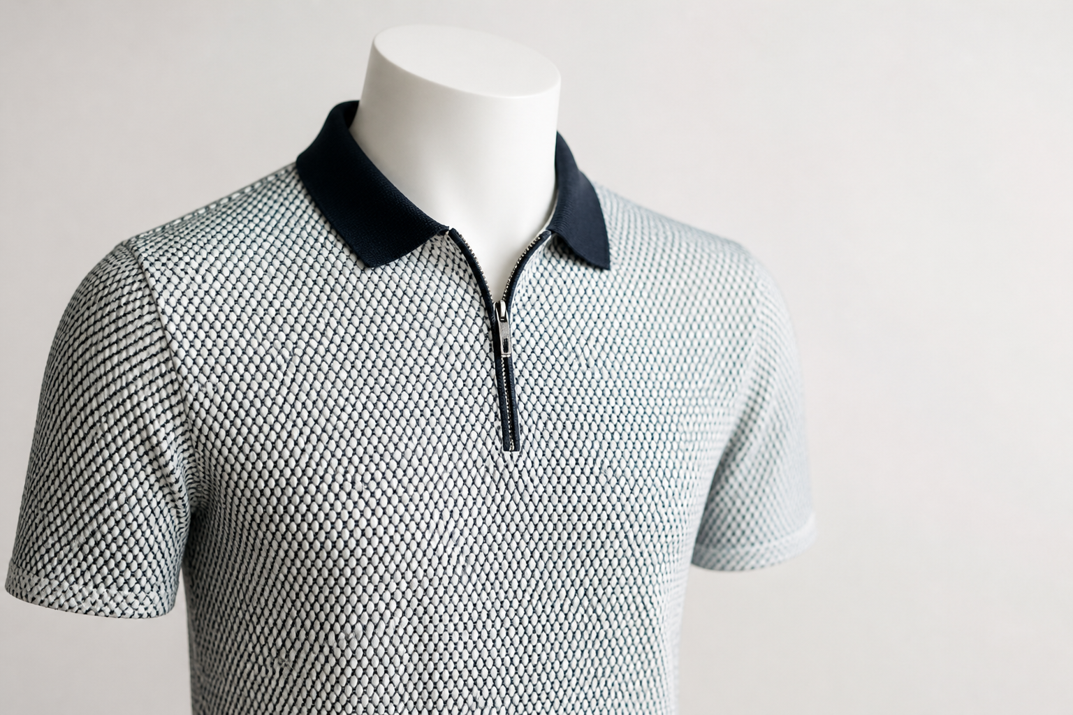 Detail of the premium flat-knit cotton texture showing tight weave and soft hand-feel