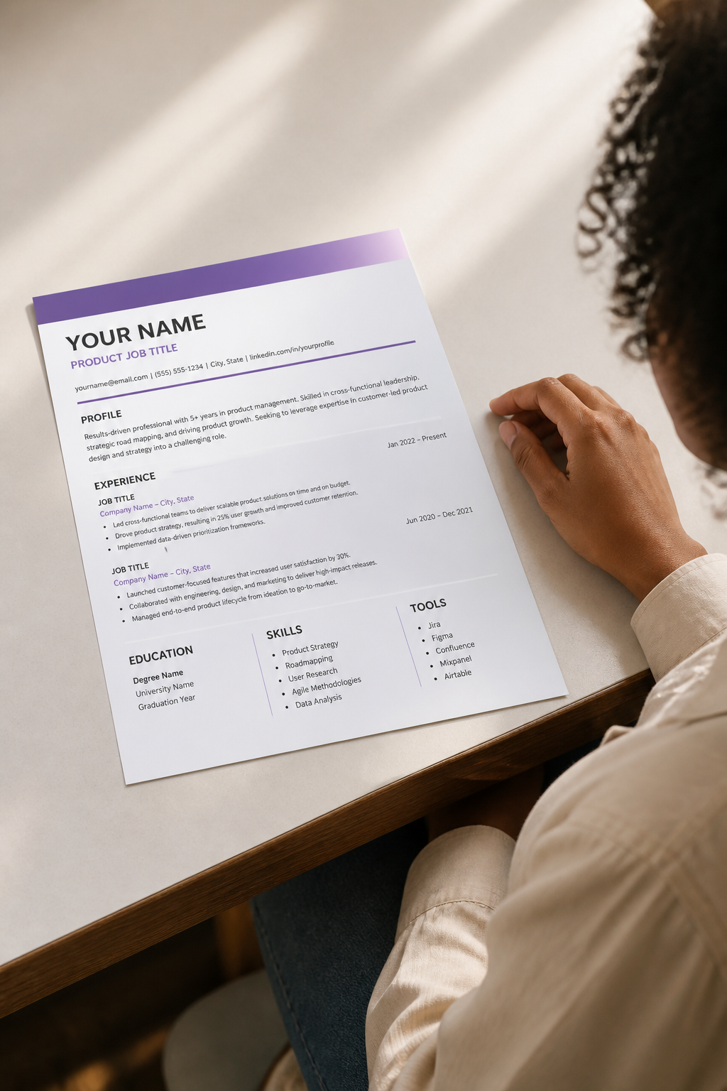 Bold modern resume template with purple gradient header and three-column skills layout