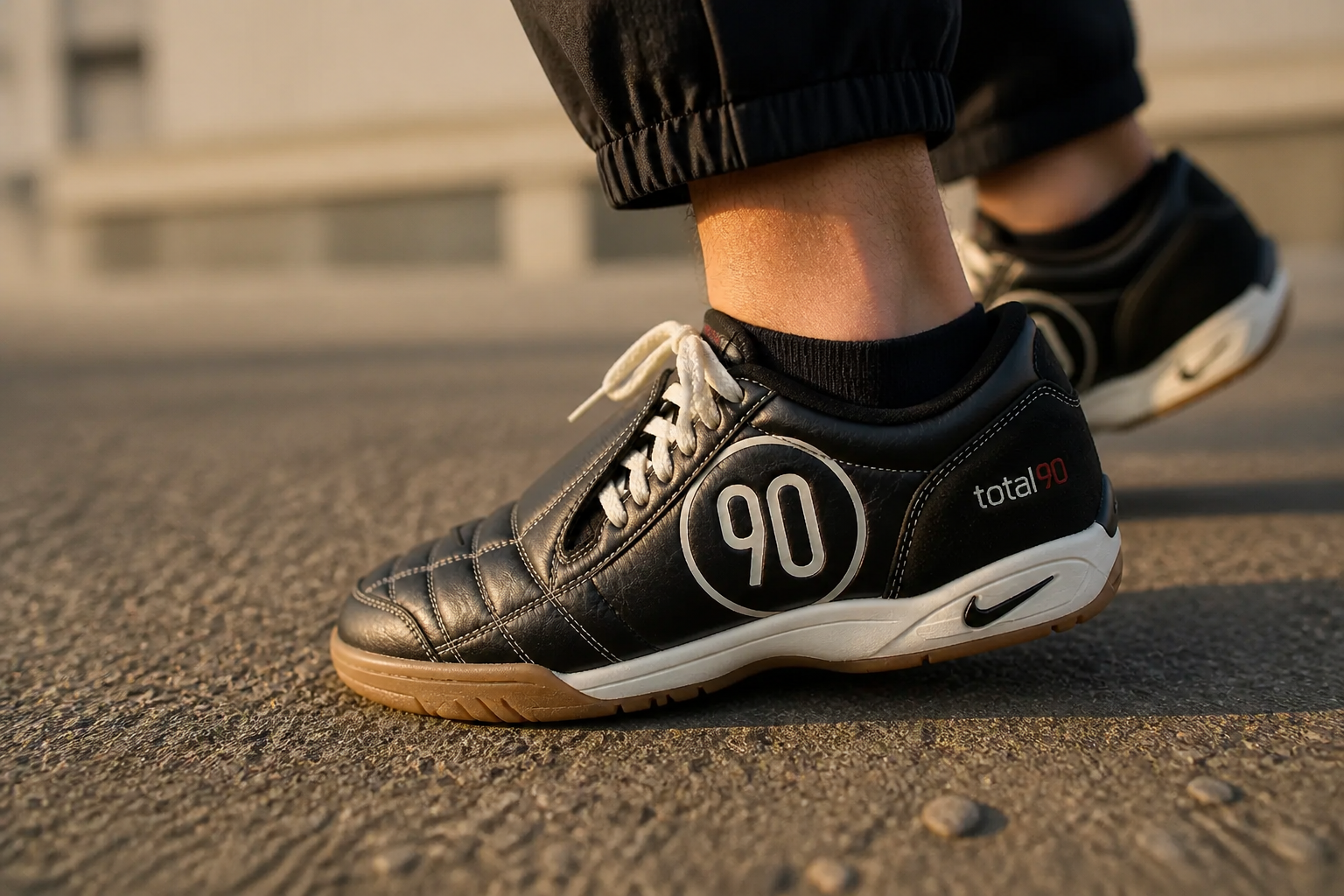 Close-up lifestyle shot of a person walking confidently on pavement showing the cushioned sole bending naturally with each step in warm afternoon light