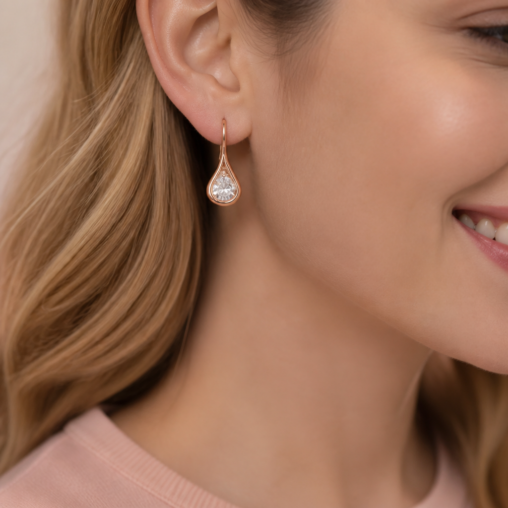 Detailed side view showing the warm 18K rose gold finish on the earring setting with subtle metallic sheen