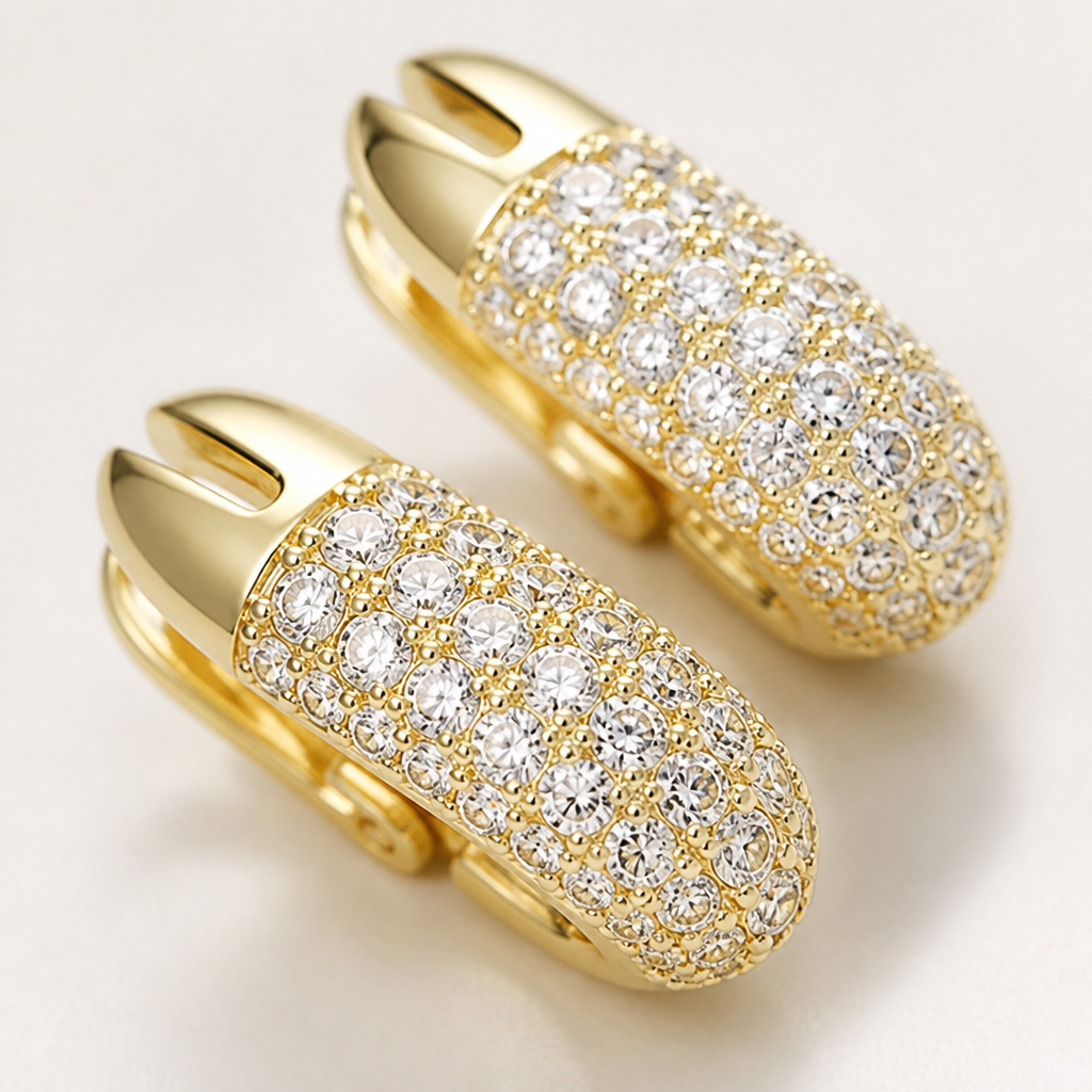 Macro shot of pav&eacute; crystals set into the 18K gold-finish hoop, showing each tiny crystal sparkling like a constellation of stars across the curved metal surface