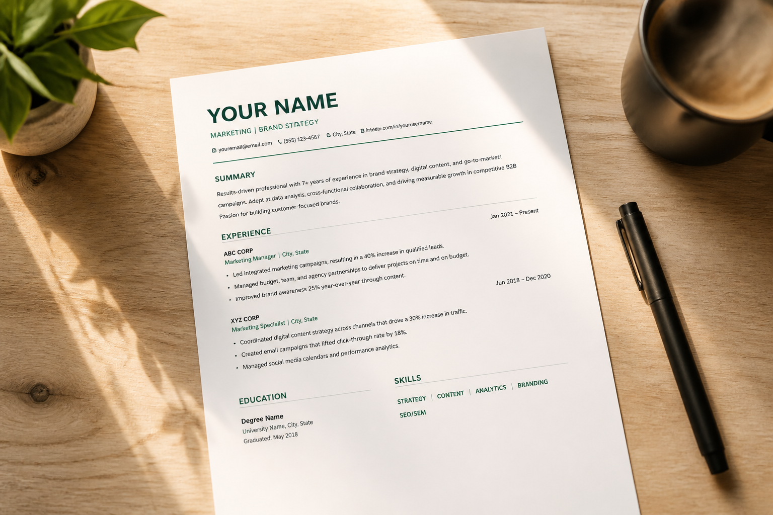 Overhead flat-lay of a beautifully printed resume on a clean light wooden desk with a coffee cup, pen, and small plant, soft warm sunlight streaming in