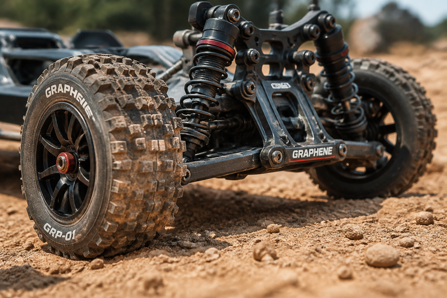 Close-up of GRAPHENE RC car wheels and suspension system showing build quality