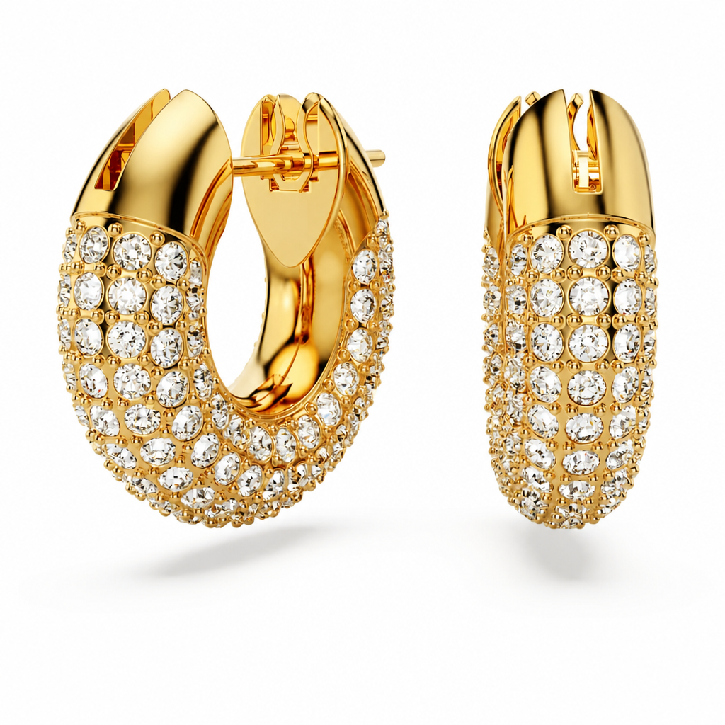 Macro product photograph of the Dextera hoop earring's sculptural pav&eacute; design in 18K gold finish showing every facet and foiled crystal detail in soft warm lighting