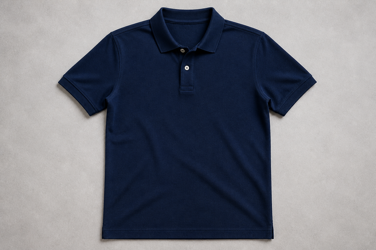 Plain generic unbranded basic cotton polo t-shirt laid flat on neutral background