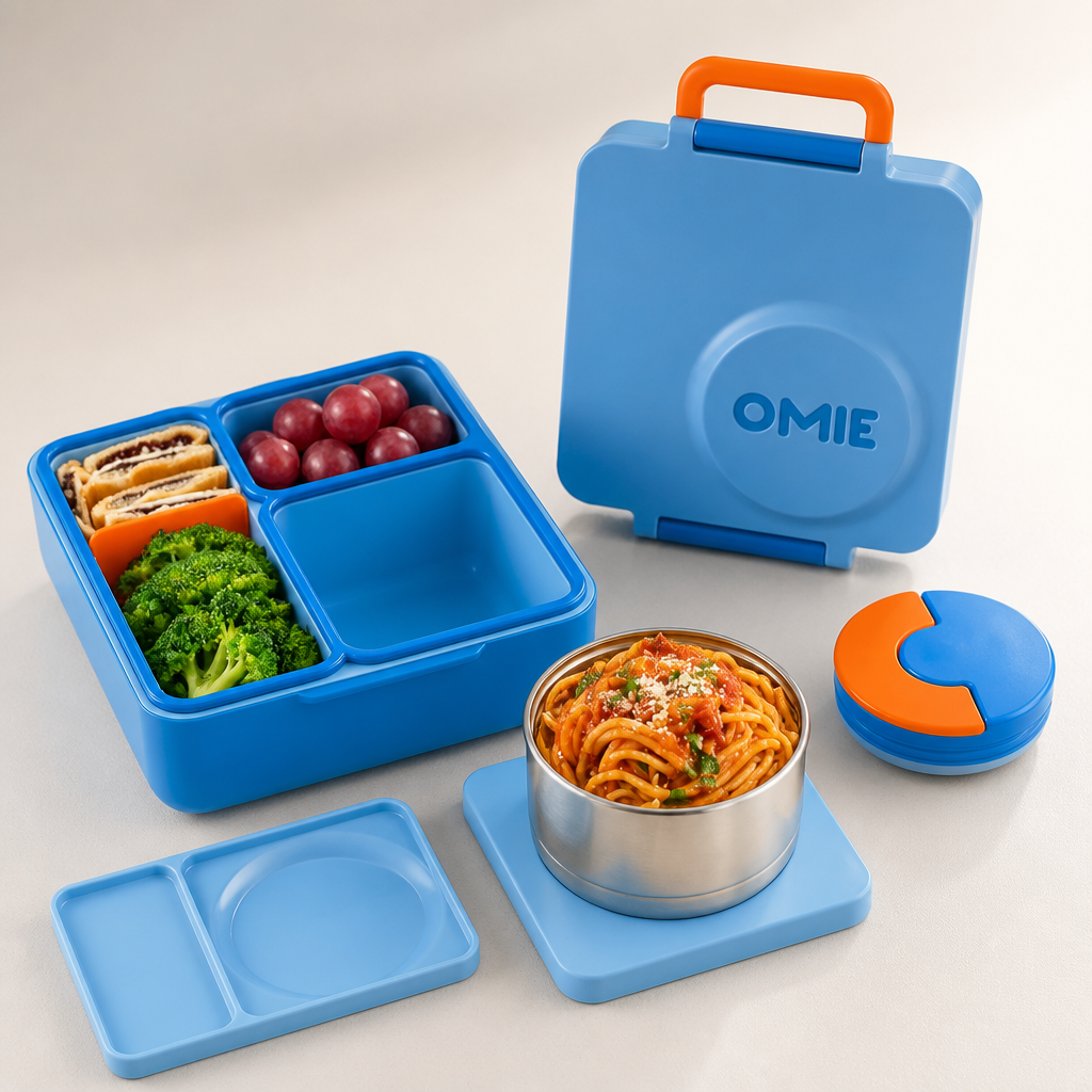 Premium Bento Box set showing main thermal container, divider insert, stainless steel utensils, and premium carrying case arranged on a clean surface