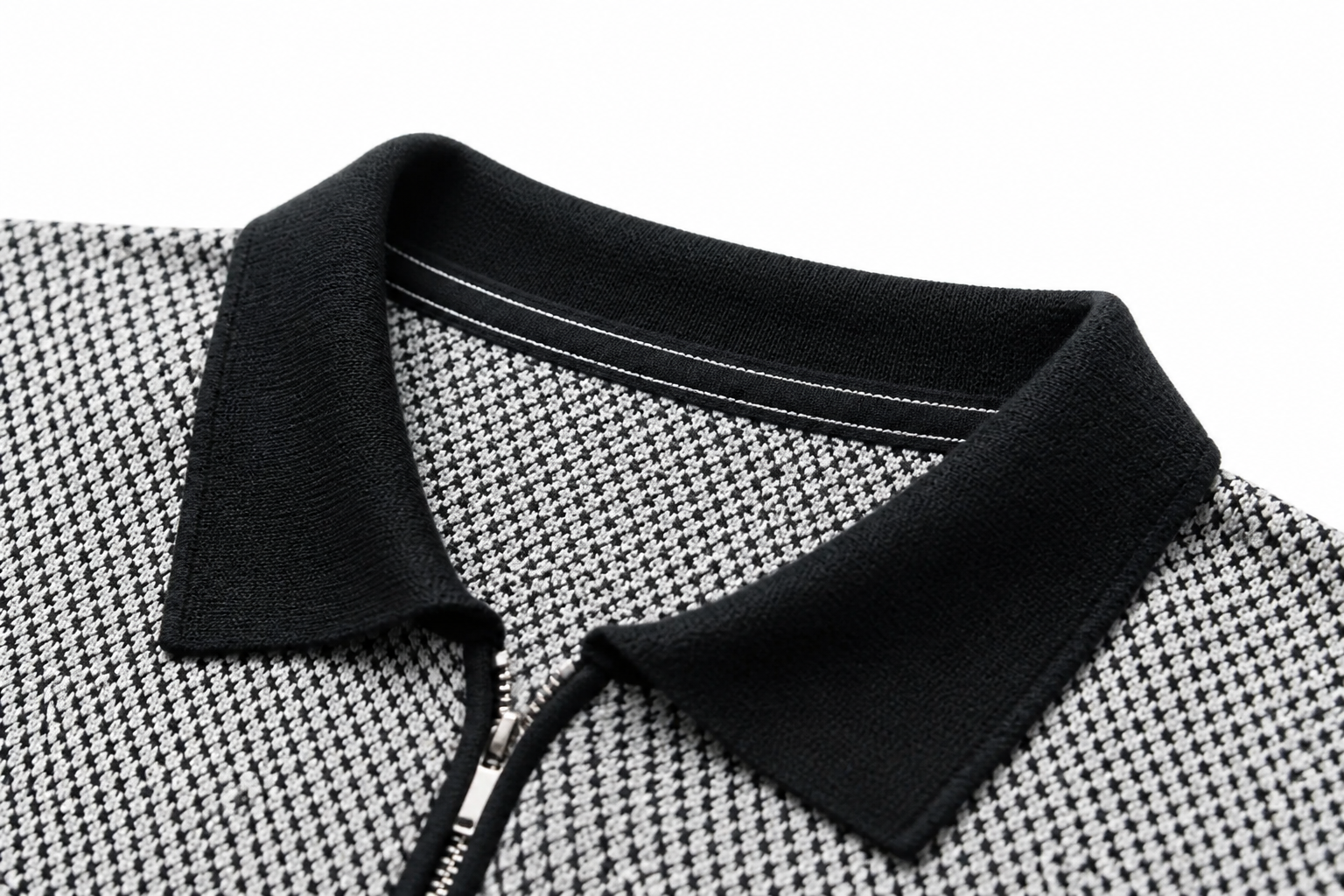 Detailed close-up of the structured polo collar, showing shape, stitching detail, and clean tailored finish