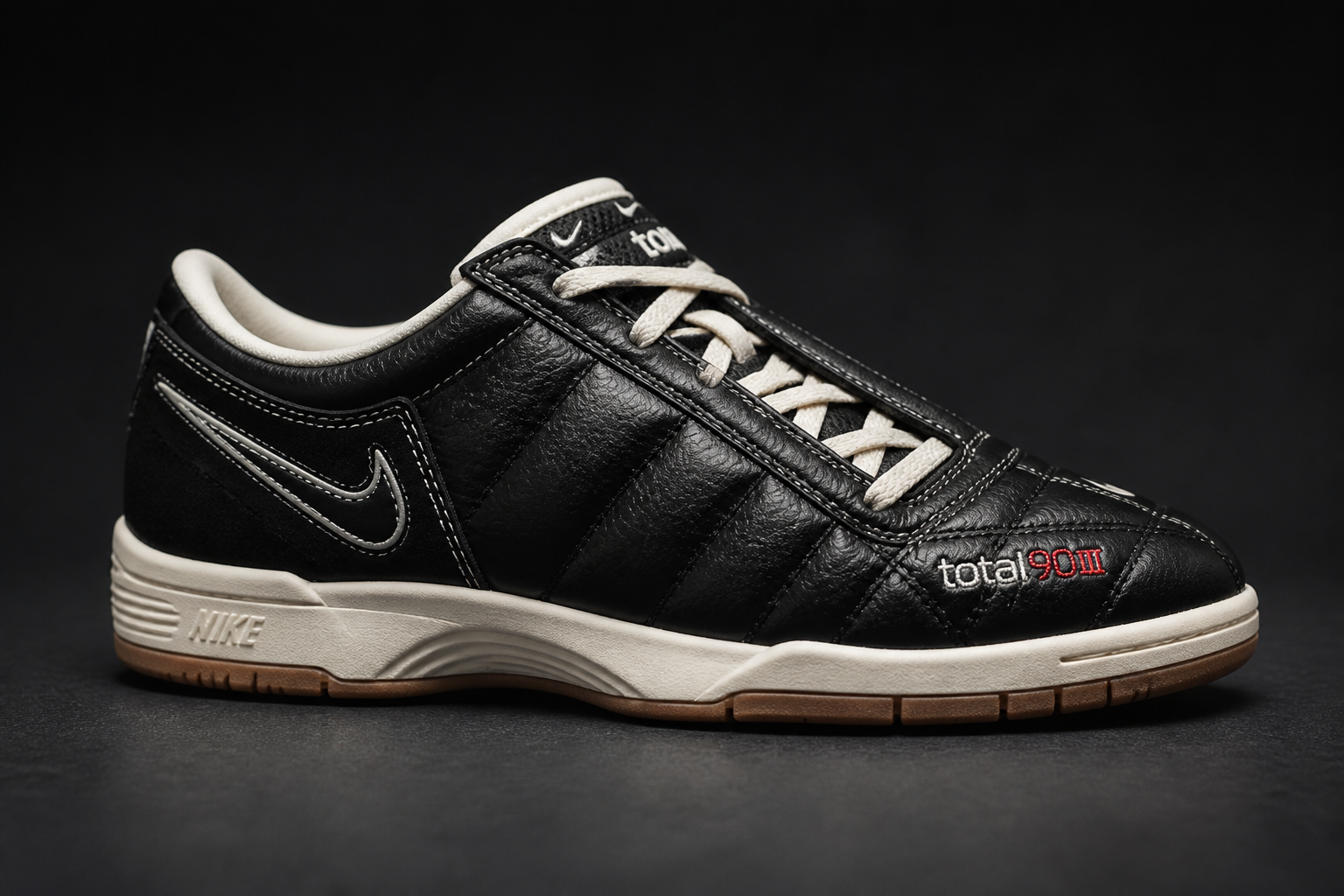 Nike Total 90 Premium sneakers featuring iconic Y2K quilted upper design with asymmetrical lacing in heritage colorway, displayed on clean dark background